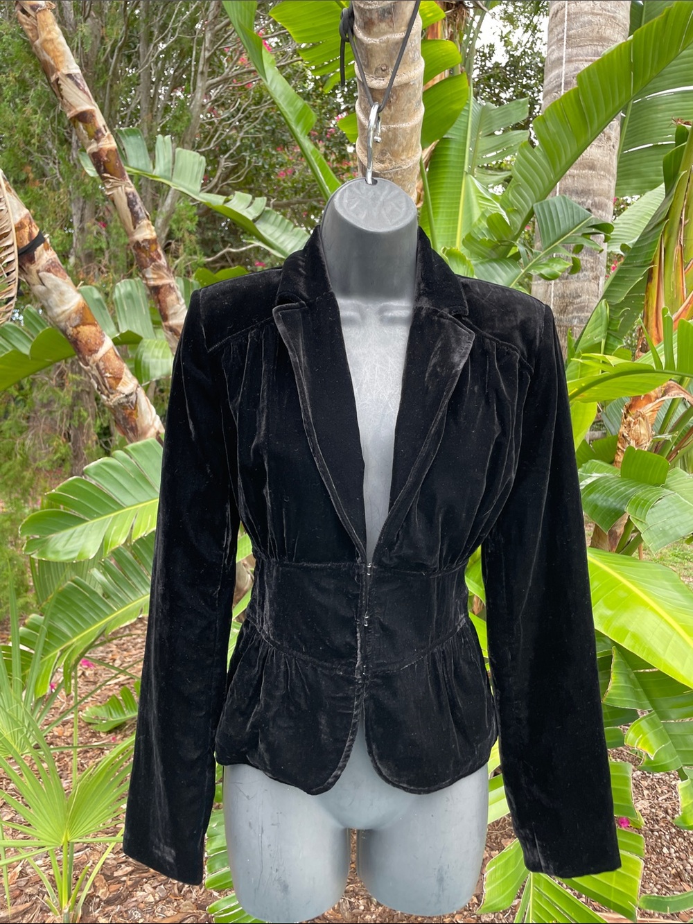 velvet jacket with fitted waist and a slight peplum